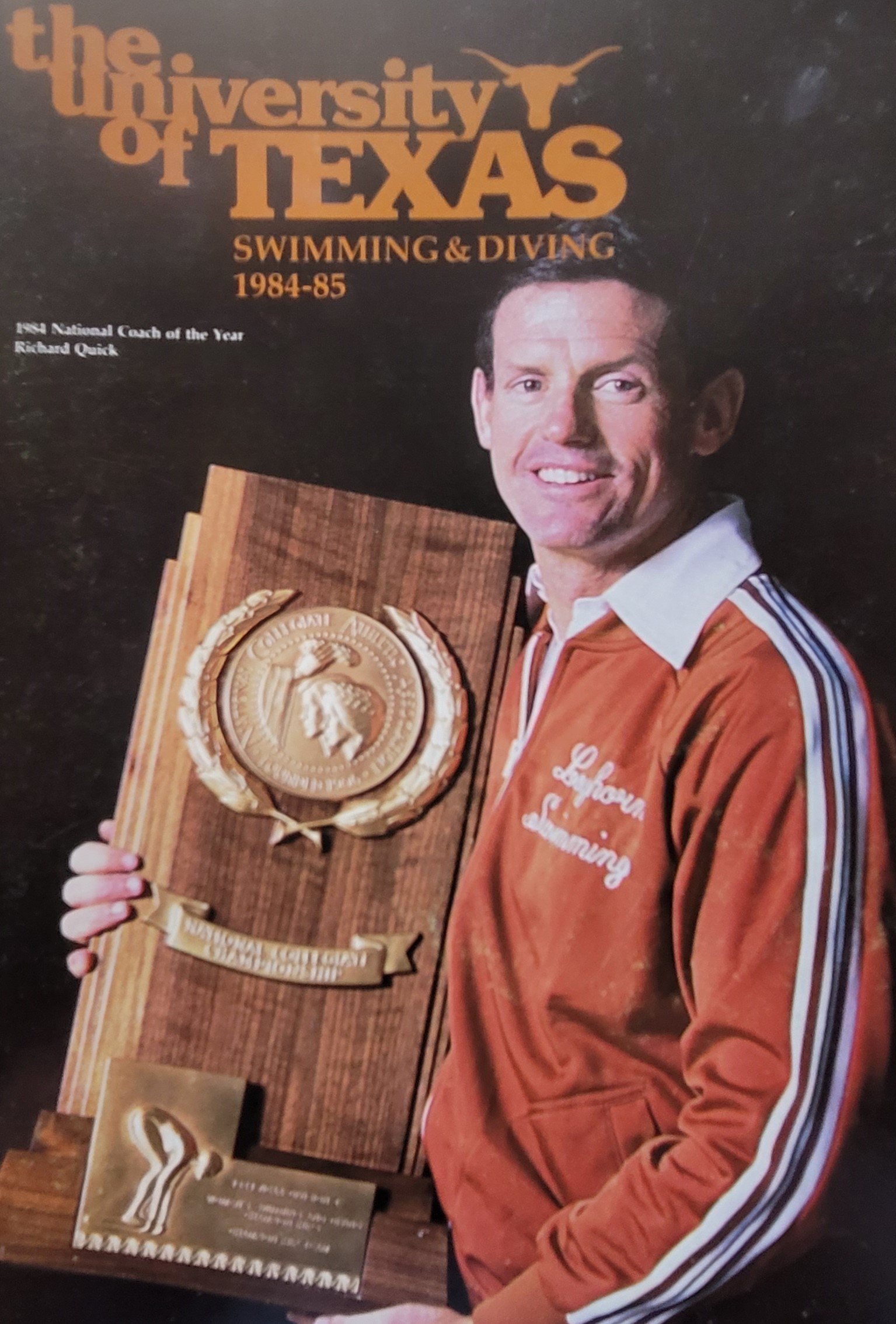  Coach Quick holding the national championship trophy.