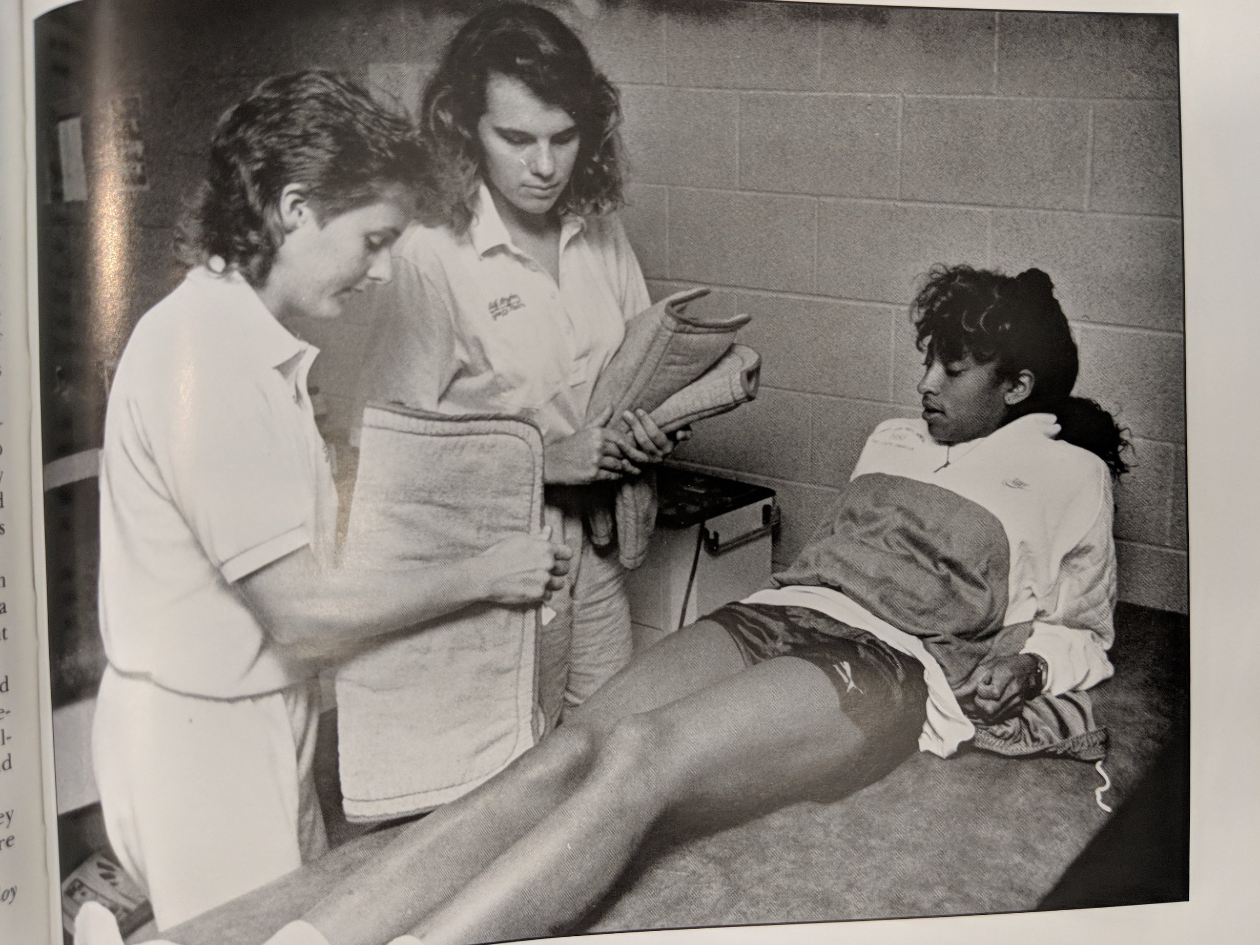  Mitzi Laughlin and Andrea Johnston work with cross country runner Shelly McBride 