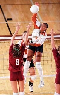  Among most prolific players in UT history  1995 National Freshman of the Year  Earned All-America, all-conference and NCAA all-regional honors all four years at UT  Named to Big 12 "10th Anniversary Team" in 2005  Was UT's all-time leader in kills, 