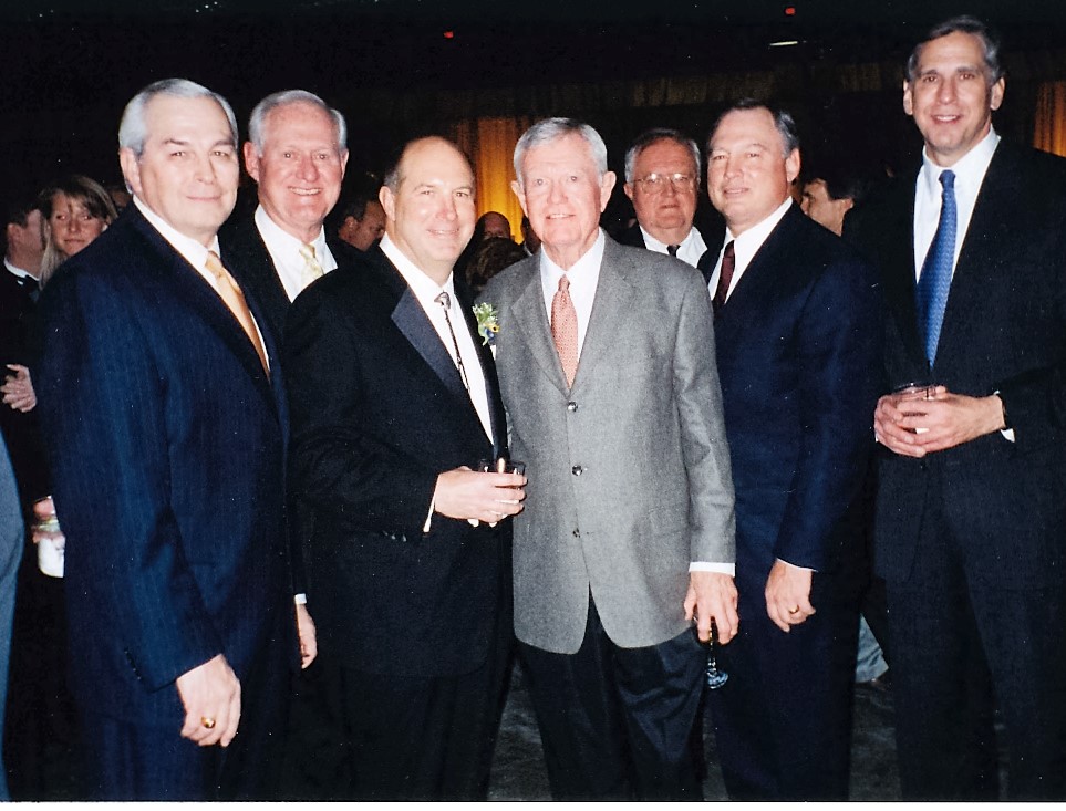 Loyd is second from left next to Gene Powell and Linus Baer