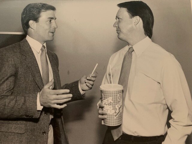 Larry Carlson talking to his past Longhorn roommate and  sportscaster Paul Alexander. 